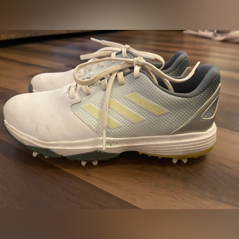 Adidas White and Gray Sneakers with Yellow Accents